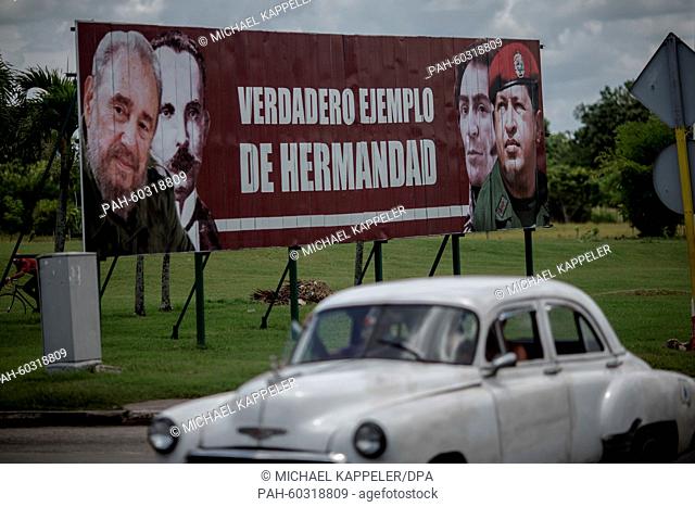 A placard which reads ""Verdadero Ejemplo de Hermandad"" (roughly. ""true role models of the brotherhood"") in Havana, Cuba, 17 July 2015