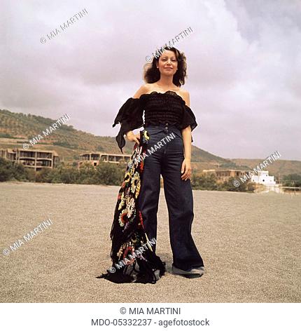 The singer Mia Martini (Domenica Rita Adriana Bertè) at the beach. 1974