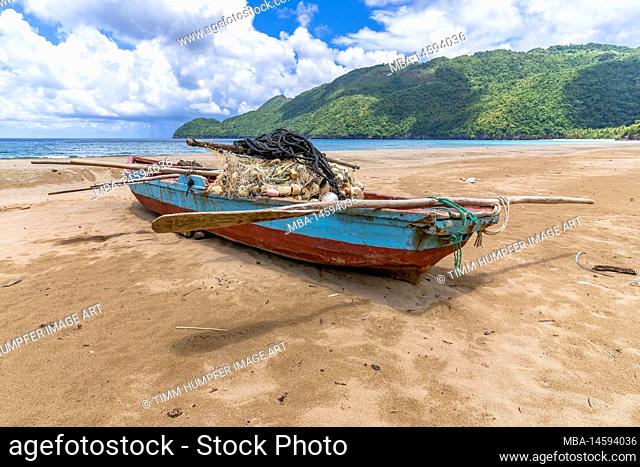North America, Caribbean, Greater Antilles, Hispaniola Island, Dominican Republic, Sama, El Valle, Colorful fishing boat on beach Playa El Valle