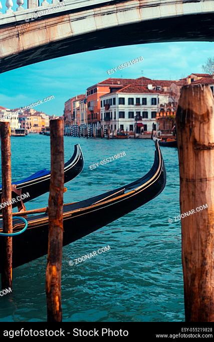 Venetian channel with ancient houses and boats, italy