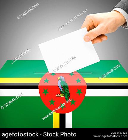 Voting concept - Ballot box painted into national flag colors - Dominica