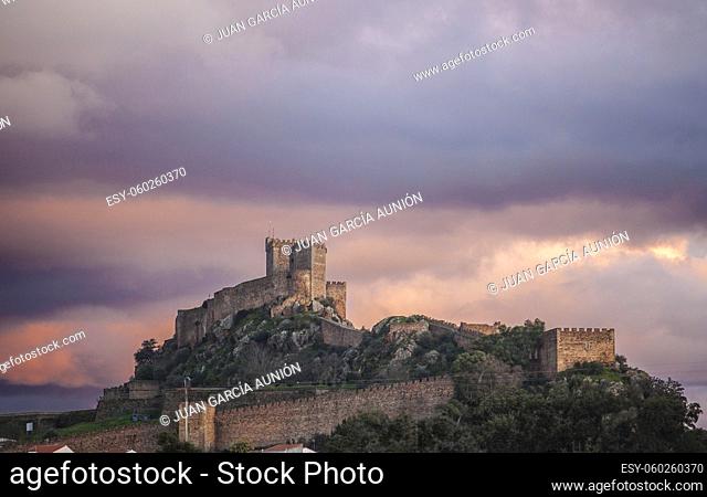Luna Castle on winter season. Taken a purple sunset cloudy day. Alburquerque, Extremadura, Spain