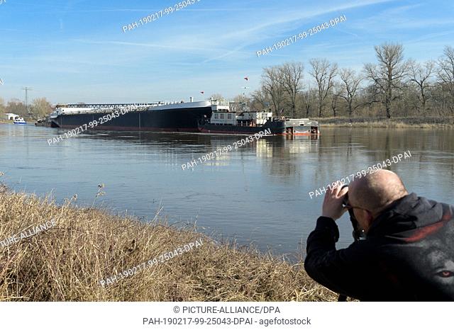 17 February 2019, Saxony-Anhalt, Dessau-Roßlau: The newly built hull of an inland tanker named ""Spera"" of the Czech shipping company CSPL is being transported...