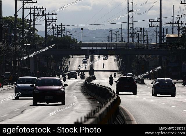 A highway with only a few vehicles are seen during the enhanced community quarantine in Manila, Philippines
