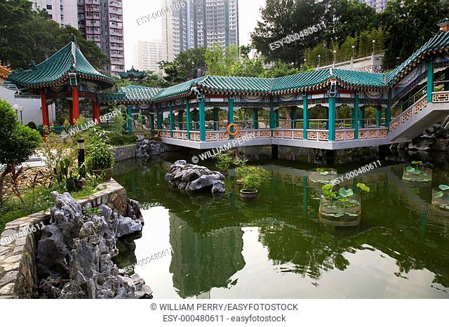 Chinese Good Fortune Water Garden Modern Buildings Wong Tai Sin Taoist Temple Kowloon Hong Kong Surrounded by Modern Apartment Buildings
