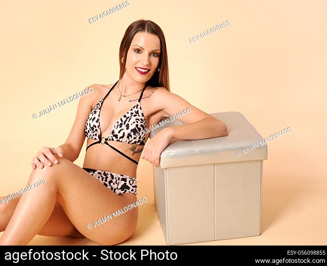 Beautiful Young Woman with Bikini or Swimwear Fashion and Sexy Posture