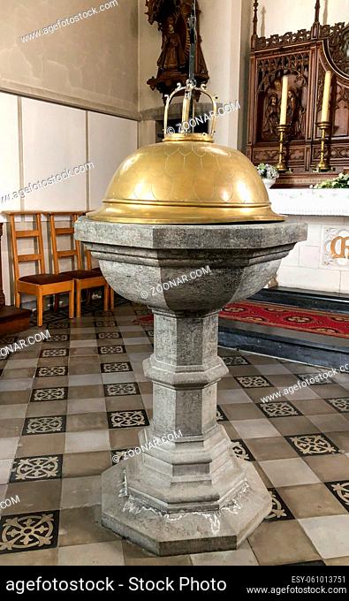 Baptism font in a catholic or christian church