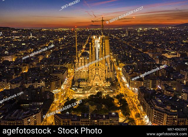 Nativity Facade of the Sagrada Família and Eixample in Barcelona in the evening twilight. (Catalonia, Spain)