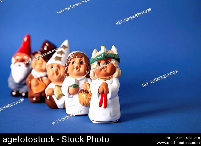 Christmas singing figurines on blue background
