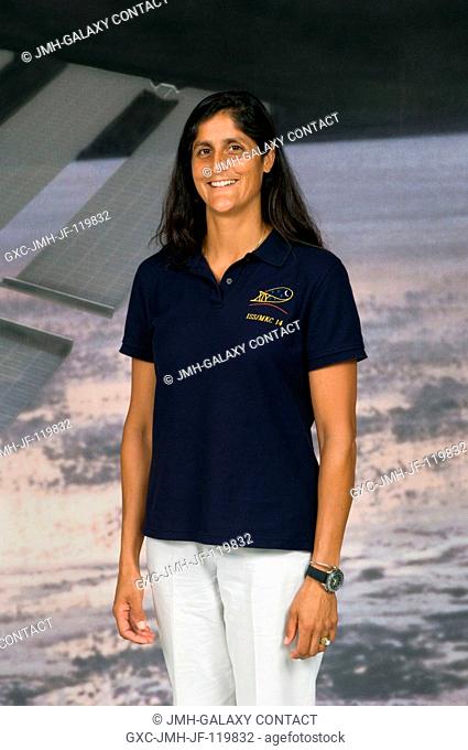 Astronaut Sunita L. Williams, Expedition 14 flight engineer, poses for a photograph following the July 13 press conference at the Johnson Space Center