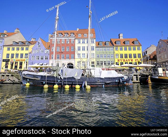 Working boats at dock during summer in Nyhavn, Copenhagen