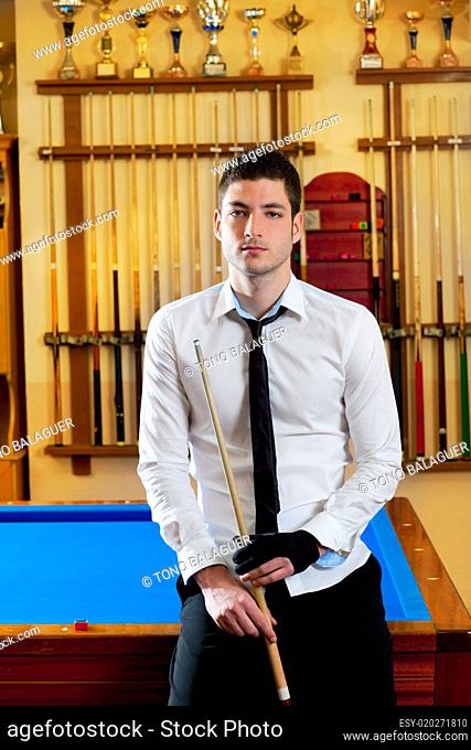 Billiard handsome young man with shirt cue and tie