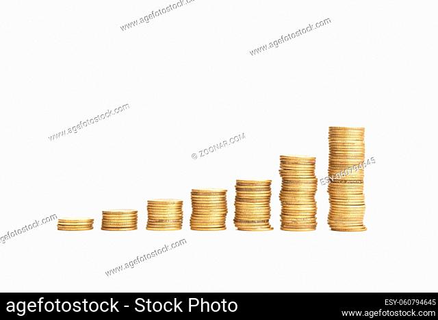 Rising Coin stacks on a white background. Growth, income, savings, investment concept. Symbol of wealth