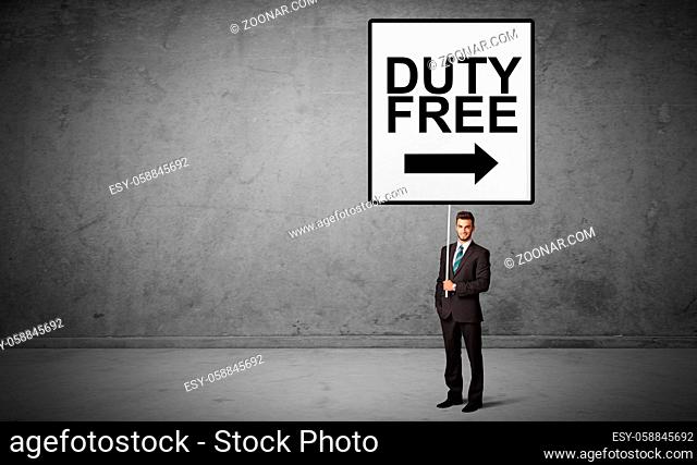 business person holding a traffic sign with DUTY FREE inscription, new idea concept