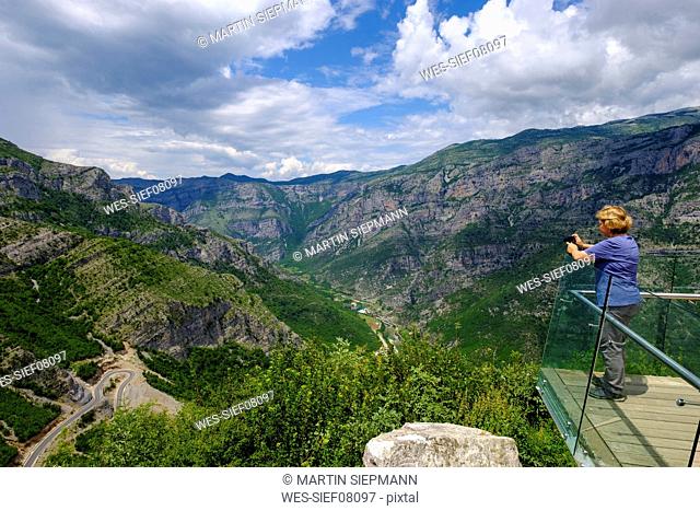 Albania, Shkoder County, Albanian Alps, Cem Canyon, observation point, hiker photographing