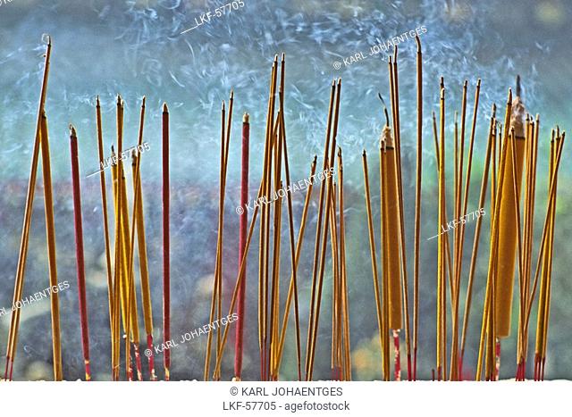 close-up smoking incense sticks, religious rites, China, Asia
