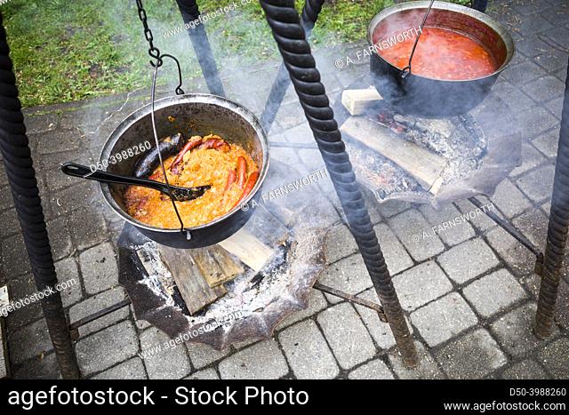 Riga, Latvia, Pots cooking over an open fire