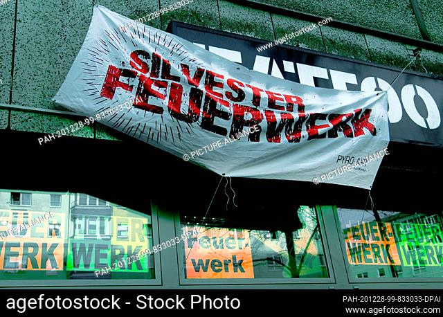 28 December 2020, Berlin: ""New Year's Eve fireworks"" is written on the advertising banner at a shop on Frankfurter Allee