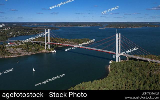 TjÃ¶rnbron Bridge to the archipelago island of TjÃ¶rn on the west coast of Sweden from above, sunshine on the day with a blue sky