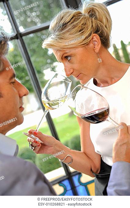 Tourism - Couple tasting wine in a Castle
