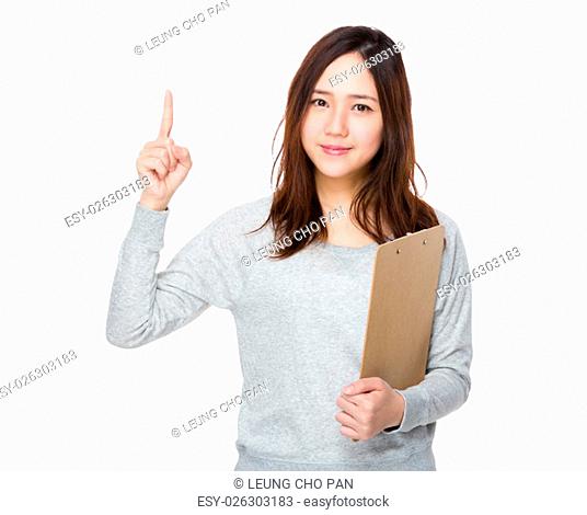 Young woman hold with clipboard and finger up