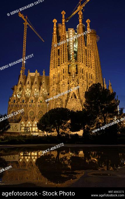 Nativity Facade of the Sagrada Família and Eixample in Barcelona at blue hour. (Catalonia, Spain)