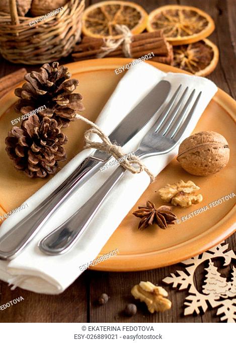 Festive table setting with spices - rustic table setting