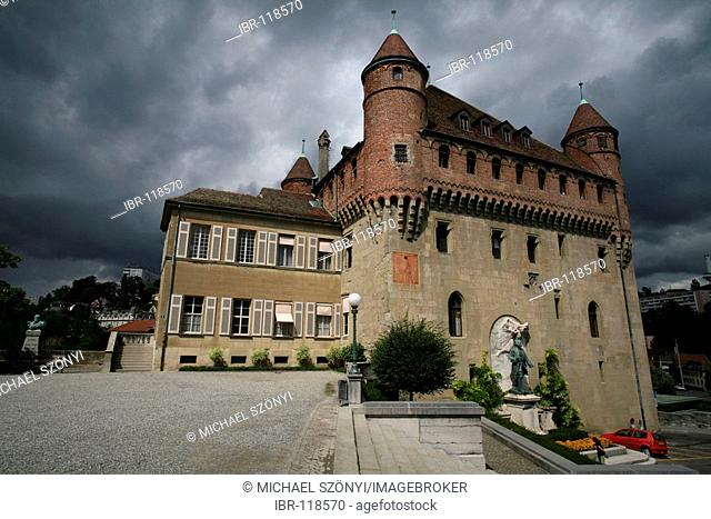 Looming thunderstorm and black clouds behind the Saint-Maire castle in the old suburbs of Lausanne, Waadt, Switzerland