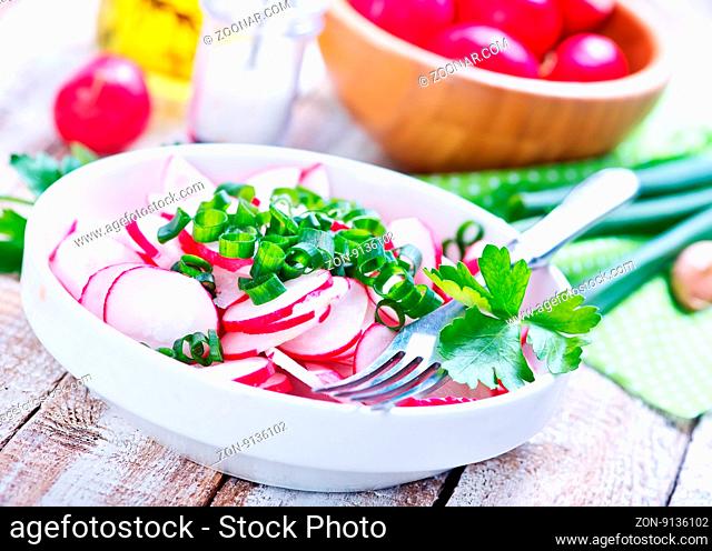 radish salad in bowl and on a table