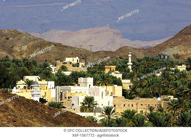 Fortress-like residential houses in an Araba village in the Hajar al Gharbi Mountains, Bahla, Dhakiliya Region, Sultanate of Oman