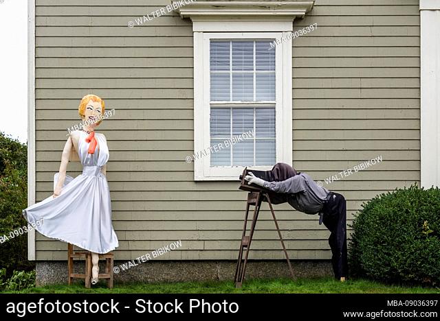 Canada, Nova Scotia, Mahone Bay, Scarecrow Festival, scarecrows in the likeness of a photographer and model