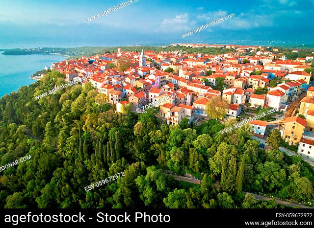 Town of Omisalj on Krk island green hill aerial view, Kvarner bay of Croatia