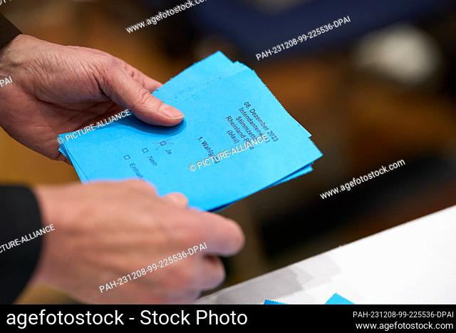 08 December 2023, Rhineland-Palatinate, Mainz: The ballots for the election of the Director-General of Südwestrundfunk are counted Kai Gniffke was re-elected...