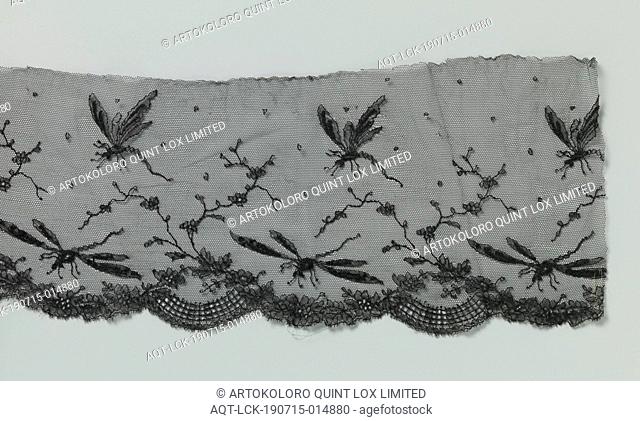 Strip of black machined side with dragonflies, Strip of black machined side: machined Chantilly lace. The repeating pattern consists of two flying dragonflies