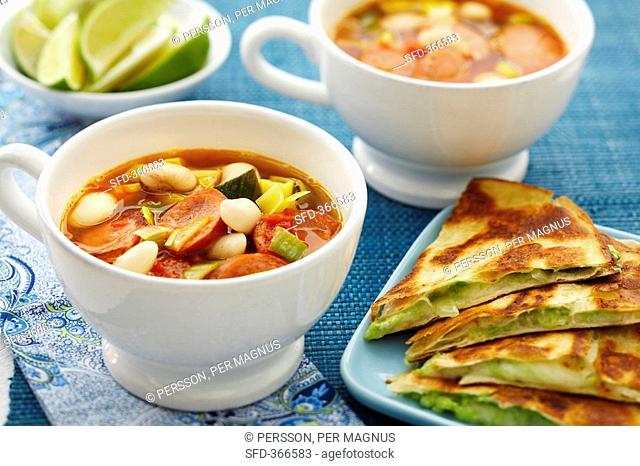 Bean soup with chorizo, avocado quesadillas