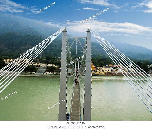 Suspension bridge across a river, Ram Jhula, Ganges River, Rishikesh, Dehradun District, Uttarakhand, India