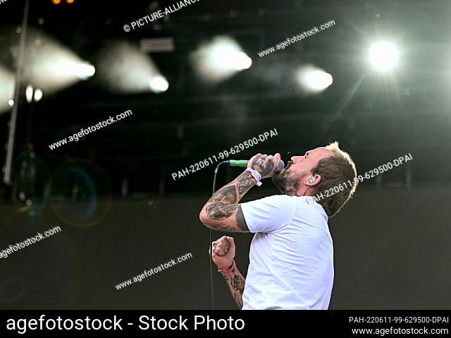 11 June 2022, Berlin: Singer Joe Talbot of the British band Idles performs on stage at the Tempelhof Sounds Festival on the grounds of the former Berlin...