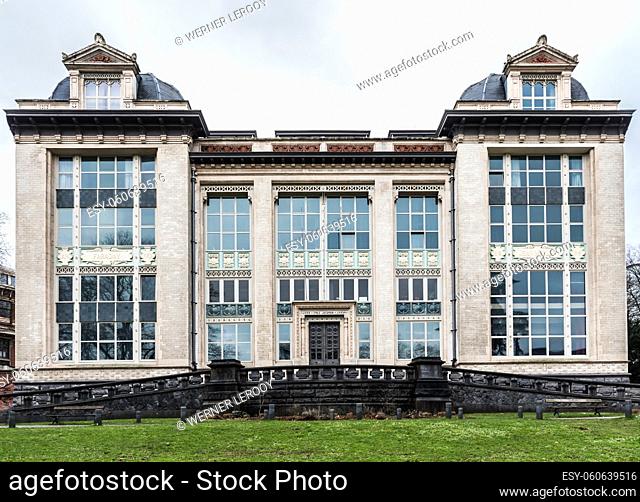 Ixelles, Brussels Capital Region, 02 15 2018: White neo classical facade of the Emile Jacqmain lyceum high school in the European district, Leopold Park