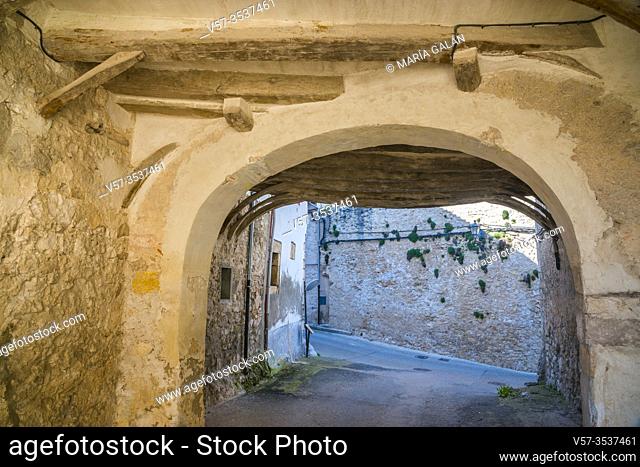 Arch and street. Fuentidueña, Segovia province, Castilla Leon, Spain