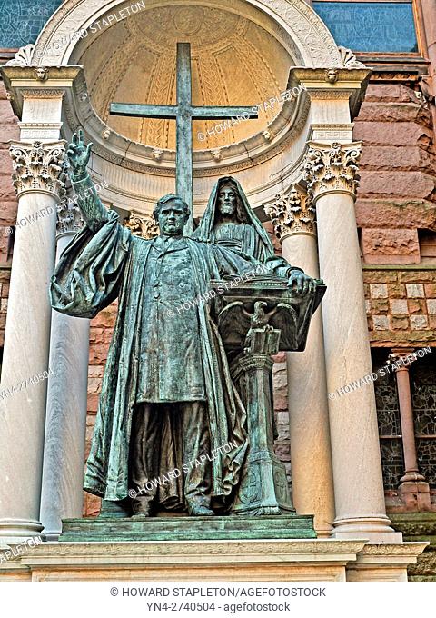 Statue of Phillips Brooks along side the Trinity Church on Copley Square in Boston, Massachusets. Brooks was rector of Holy Trinity Church and is known for...
