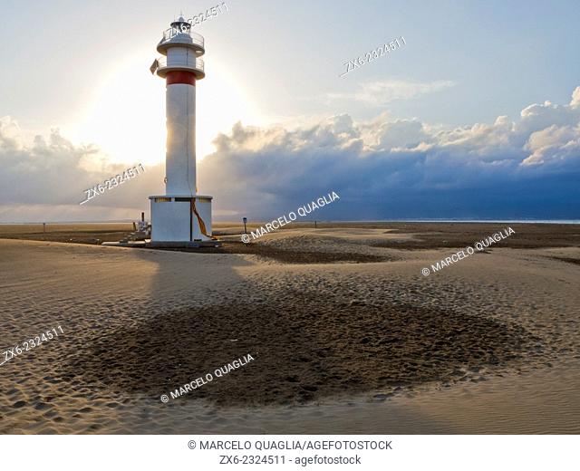 Lighthouse at Fangar Peninsula. Ebro River Delta Natural Park, Tarragona province, Catalonia, Spain