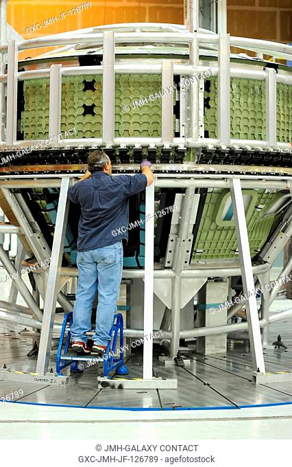 The bulkhead and nosecone of the Orion Ground Test Article are joined using friction stir welding at the Michoud Assembly Facility