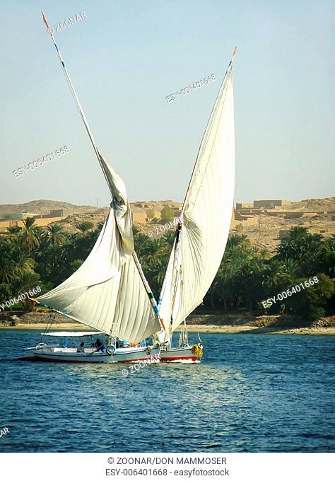 Felucca boats sailing on the Nile river, Aswan, Eg
