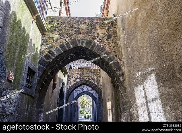 Lane of the Arches (Via degli Archi), medieval black pumice lane. Randazzo, Metropolitan City of Catania, Sicily, Italy