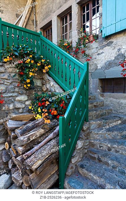 Stairway to the entrance of a private residence in the medieval village of Yvoire in France
