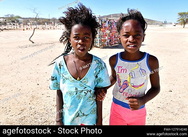 Children in the Spitzkoppe area in front of their sales kiosk, where they offer tourists soft drinks for sale, taken on 03.03.2019