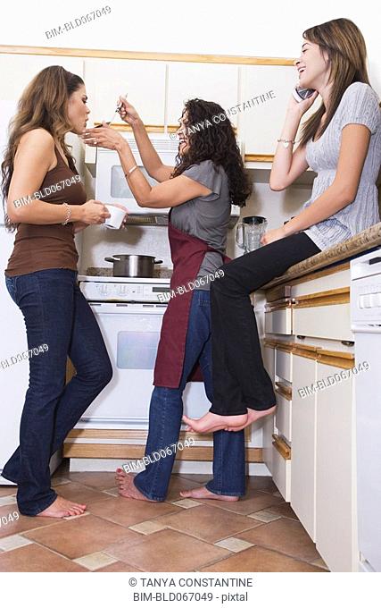 Multi-generational women in kitchen