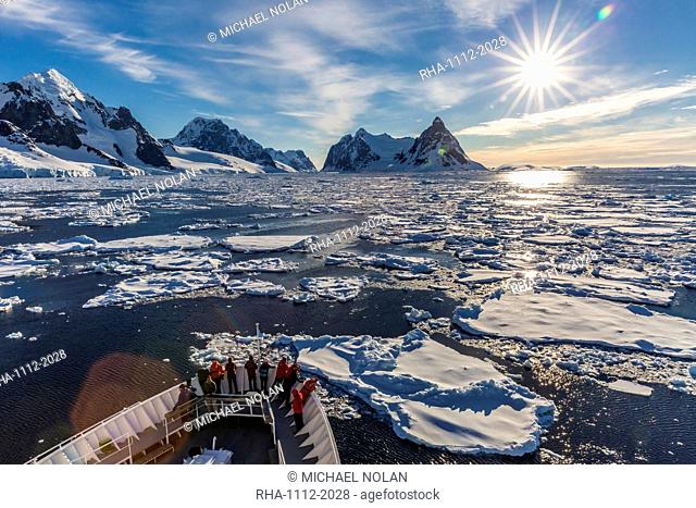 The Lindblad Expeditions ship National Geographic Explorer in the Lemaire Channel, Antarctica, Polar Regions