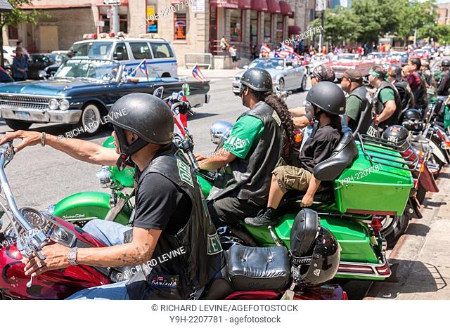 The Dirty Ones motorcycle club prepares to ride in the Brooklyn Puerto Rican Day Parade in the Bushwick neighborhood of Brooklyn in New York