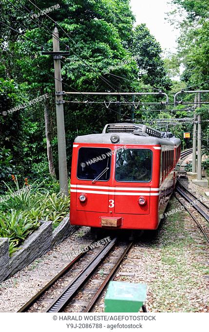 "Rio de Janeiro, Brazil: Famous train """"Trem do Corcovado"""" travelling up to the mountain top of Corcovado with it's christ statue Cristo Redentor